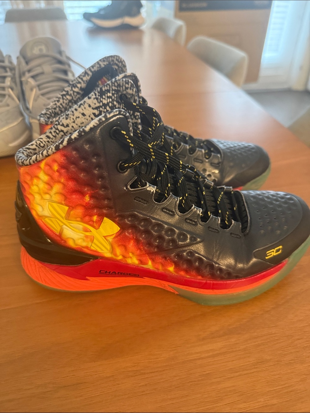 Under Armour Black Basketball Shoes with Red and Yellow Flame Accent